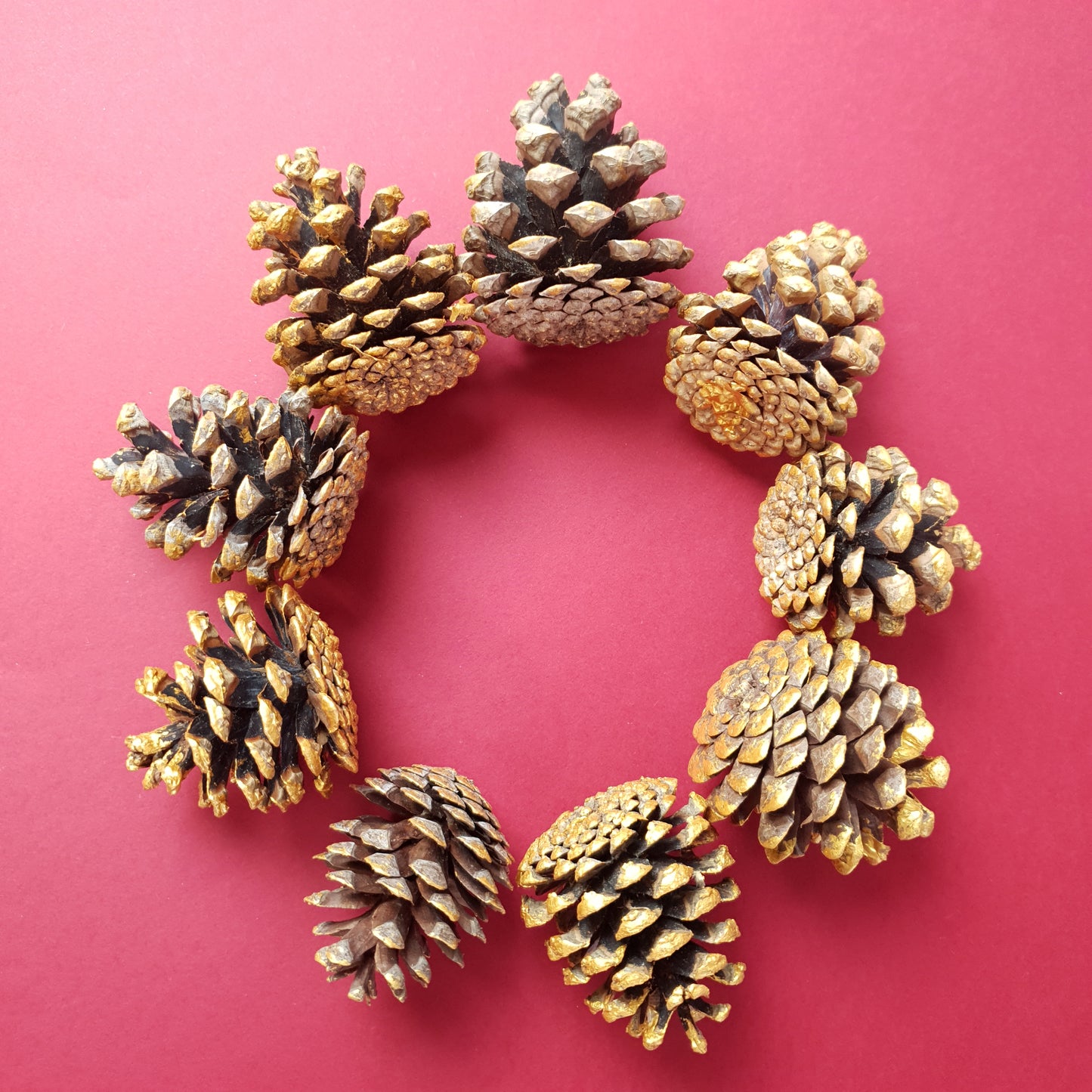 Set of 9 small gold pine cones